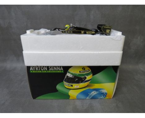 A BOXED MINICHAMPS 1:18 SCALE AYRTON SENNA COLLECTION LOTUS RENAULT 97T 1985 