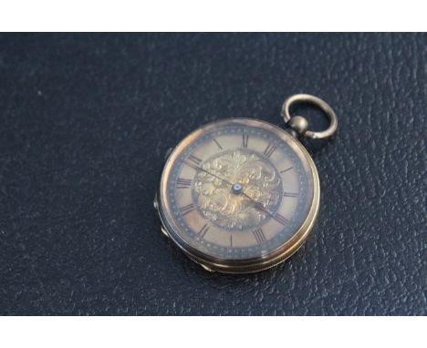 A VINTAGE OPEN FACED POCKET WATCH, stamped K 18, W 3.5 cm, approx weight 323g