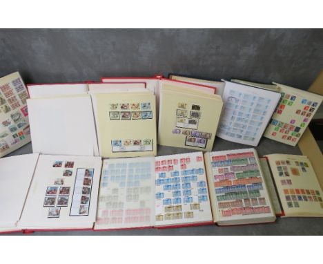 NINE STAMP ALBUMS / STOCK BOOKS, containing British / the regions stamps, mainly Queen Elizabeth II