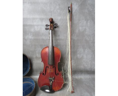 A VINTAGE CASED VIOLIN, having carved scroll and floral mother of pearl inlay to the tailpiece, with a bow, A/F, violin L 60 