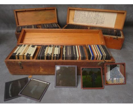 A LARGE COLLECTION OF VICTORIAN AND LATER GLASS SLIDES, contained in three boxes, to include some examples from Bernard Moore