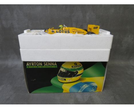 A BOXED MINICHAMPS 1:18 SCALE AYRTON SENNA COLLECTION LOTUS HONDA 99T 1987 