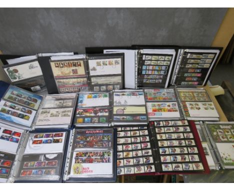 ELEVEN FIRST DAY COVER ALBUMS / STOCK BOOKS, stamp album subjects to include James Bond, Iron Maiden, FA Cup, Olympic games, 