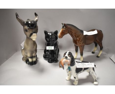 A selection of 20th century pottery figures including Trentham, Beswick and Alton