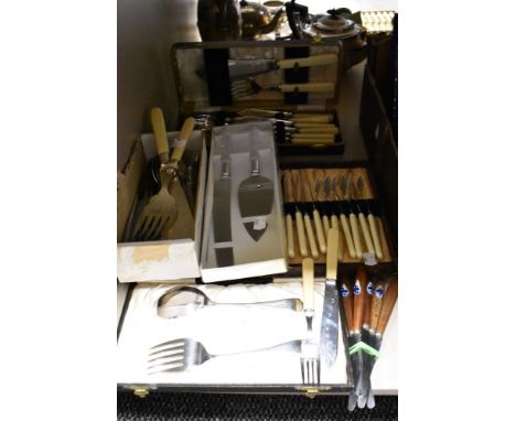 A mixed selection of flat wear including boxed fish serving set, bone handled forks, and knives having delft style ceramic de