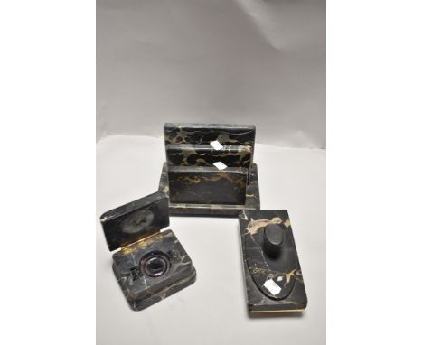 An Art Deco desk top stationary set in black marble including blotter inkwell and letter rack