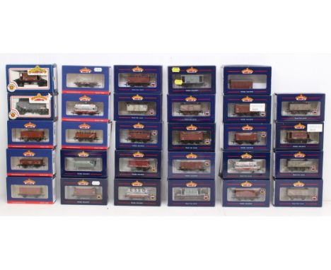 Bachmann: A collection of twenty-nine boxed Bachmann, OO Gauge rolling stock. Original boxes. General wear expected with age.