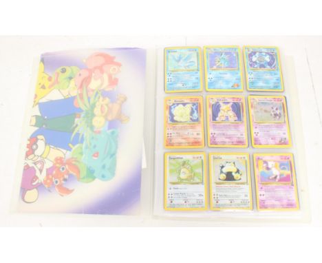 Pokemon: A folder of assorted vintage and modern Pokemon cards to include holographic and non-holographic examples. Wizards o