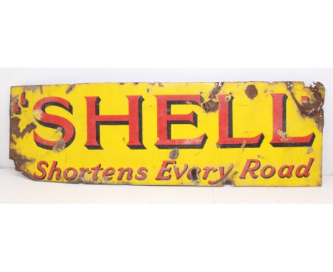 Shell: A 20th century 'Shell Shortens Every Road', vintage enamel advertising sign, yellow ground with red lettering. Rust da