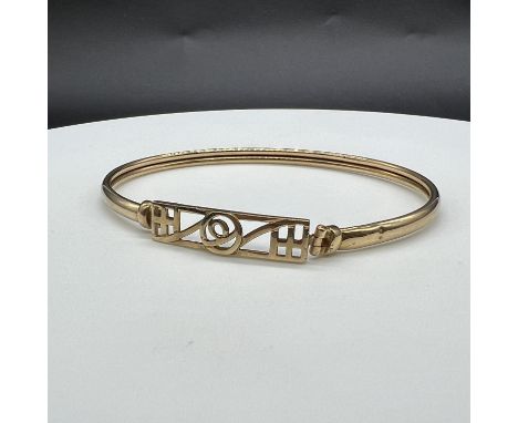 9ct yellow gold Rennie MacIntosh design bangle,
weight 6 grams,
bangle has a metal inner core spring bar including in weight