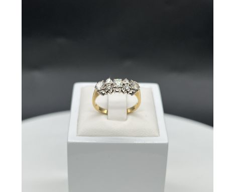 18ct yellow gold 7 stone diamond ring,
colour I-J,
beautiful cut diamonds,
size M,
3 grams in weight