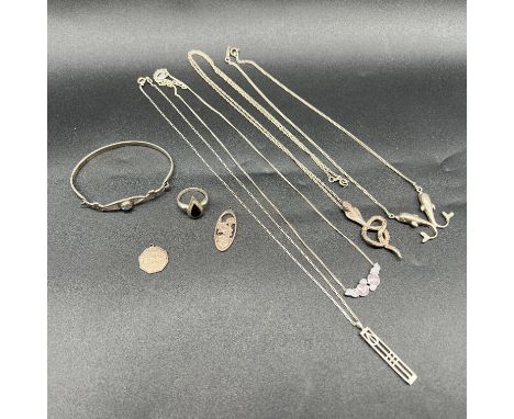Selection of silver jewellery,
necklaces,ring, bangle, 2x Saint Christophers,
total weight 47.32 grams
