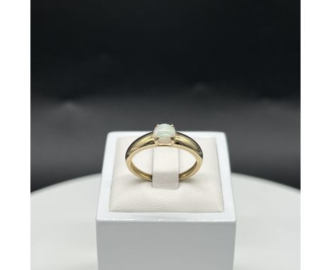 A 9ct yellow gold opal ring,
size S,
1.8 grams in weight