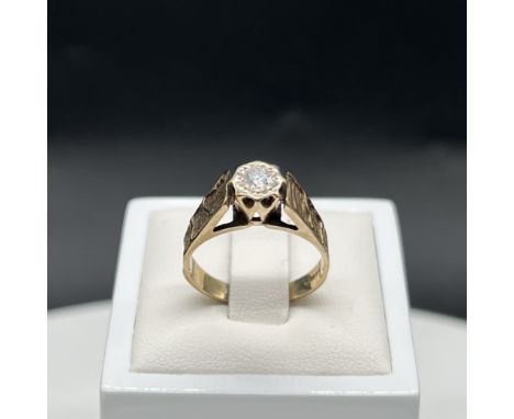 A 9ct yellow gold single diamond solitaire ring,
size M,
weight 3.1grams