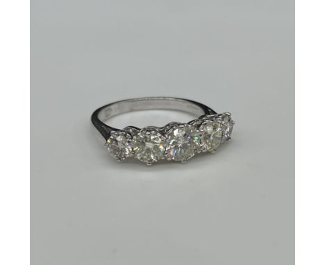 18ct white gold 5 diamond stone ring,
hallmarked 18ct gold,
colour approx H/I,
clarity S/I,
approx 4.4 grams in weight,
appro