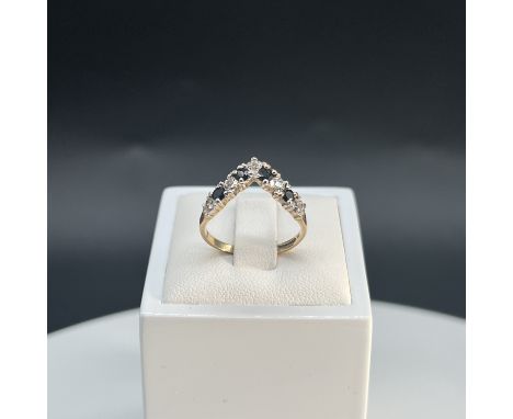 A 9ct yellow gold sapphire and diamond wishbone ring,
size M,
weight is 1.9 grams,
4x sapphires and 5 diamonds