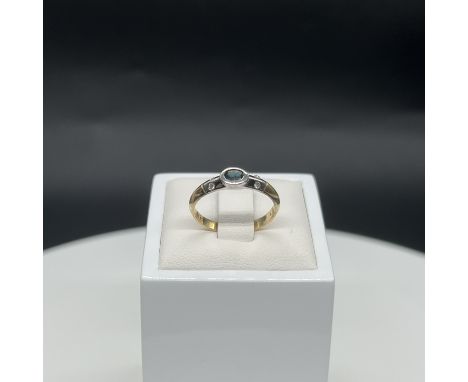 14ct yellow gold sapphire + diamond set dress ring with white gold colet,
oval mixed cut sapphire,
sapphire is 4.1mm x 3.1mm,