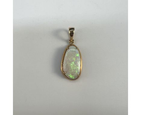 A 14ct yellow gold opal pendant,
pendant is 24mm long,
stone is 14mm x 7mm,
weight is 1.25 grams