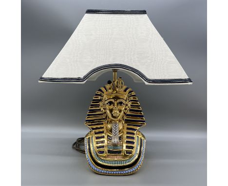 A large Egyptian lamp and shade