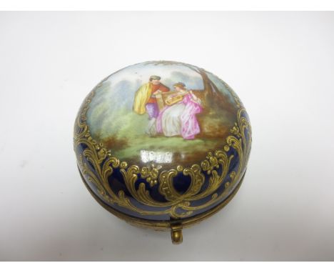 A French porcelain Box with hinged cover painted romantic couple, blue and gilt surround, 4in