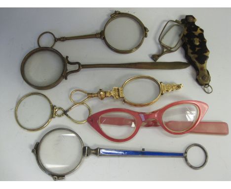 An 18th Century gold framed pair of Lorgnettes, a pair with blue enamel handle A/F and four other glasses