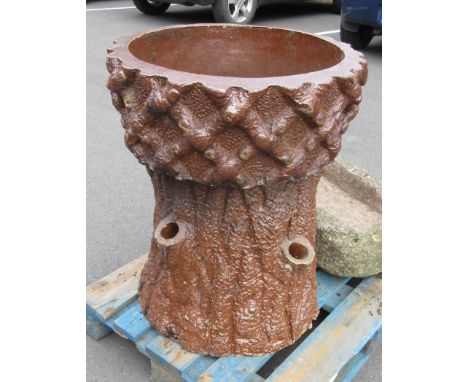 A brown glazed simulated tree trunk Planter, 31in high x 26in diam