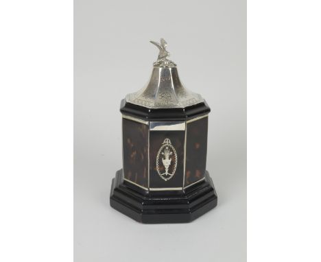 A Victorian silver and tortoiseshell Tea Caddy of octagonal form, the silver cover with bird finial above panels of tortoises