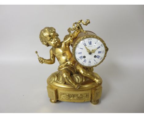 A 19th Century French Mantle Clock by Lenoir, Paris with white enamel drum dial, in ormolu case with cherub seated holding dr