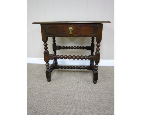 A late 17th century oak Side Table with later top on bobbin turned and square supports and stretchers, 2ft 6in