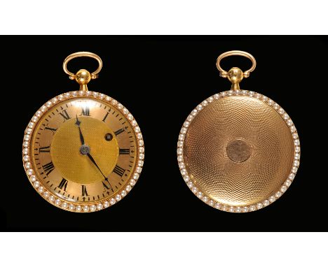 A Lady's Pocket Watch the textured gold dial with roman numerals in engine turned case with seed pearl surround to back and f