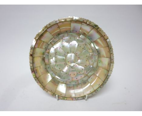 A rare Indo-Portuguese mother of pearl and brass Dish, Gujarat, India, 17th Centuryof shallow rounded form on a short foot, w