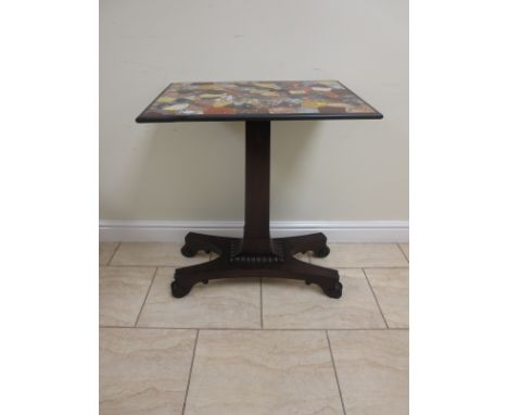 A 19th Century Occasional Table with rectangular mosaic marble top on square column, four supports and scroll feet, 2ft 5in H