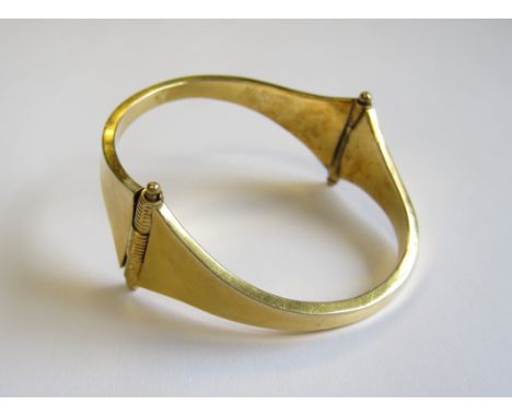 A shaped hinged Bangle, approx 21gms