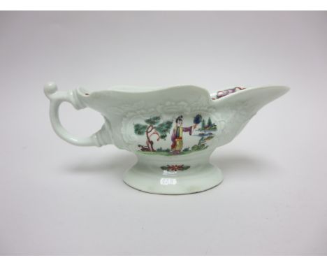 An early Worcester polychrome Sauce Boat painted chinoiserie figures within moulded cartouches, 6 3/4in, red painted workman'
