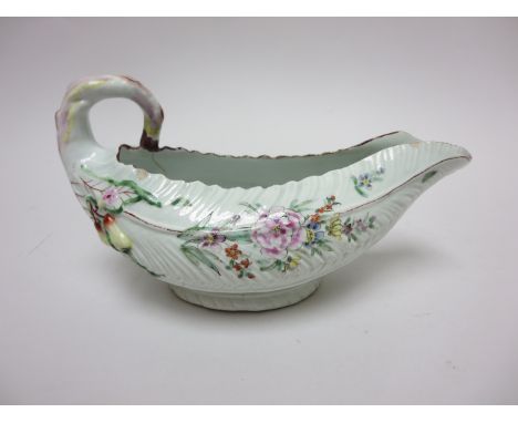 An Early Worcester polychrome Sauce Boat leafage moulded and floral painted, 7in, A/F