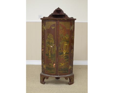 An antique lacquered bow front Corner Cupboard with small graduated shelf surmount, red ground having two doors enclosing she