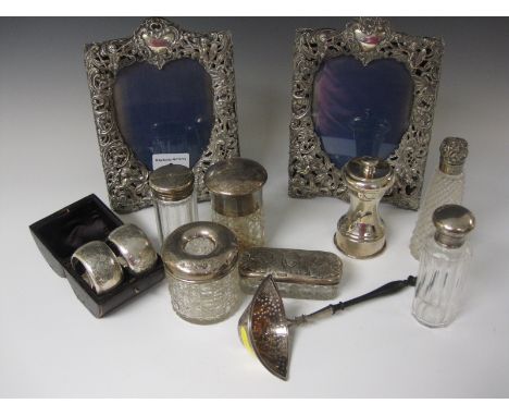 Six silver lidded Jars, Scent Bottles, Dressing Table Accessories, etc, one embossed cherubs, a pair of pierced and embossed 