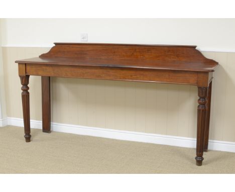 A 19th Century mahogany Serving Table with raised back, moulded top on turned tapering fluted front supports, 7ft W