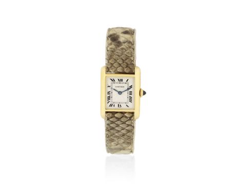 Cartier. A lady's 18K gold manual wind rectangular wristwatchModel: TankReference: 1468Date: Sold 23rd August 1988Movement: 1