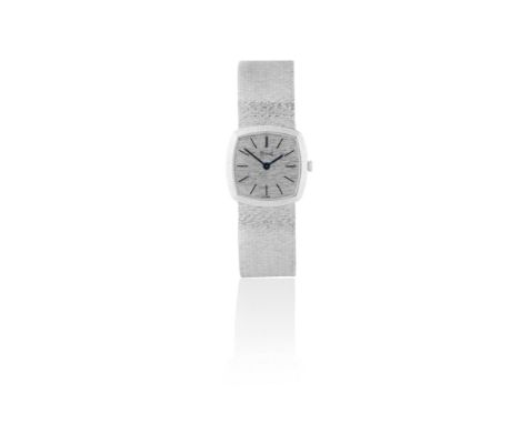 Piaget. A lady's 18K white gold manual wind cushion form bracelet watchReference: 9231-171Date: Circa 1975Movement: 18-jewel 