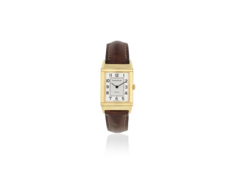 Jaeger-LeCoultre. A lady's 18K gold manual wind reversible wristwatchModel: ReversoReference: 6184.21Date: Circa 1990Movement