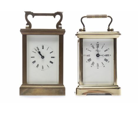 TWO BRASS CARRIAGE CLOCKS the first with Roman numeral chapter ring and blued steel hands, movement signed 'Made in England',