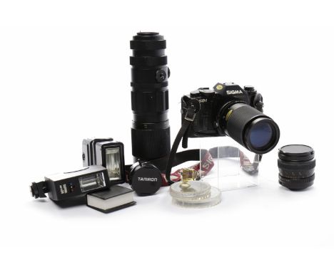 COLLECTION OF PHOTOGRAPHY EQUIPMENTto include Sigma SA-1 camera, Amron 1:3.5 70-150mm lens, Auto Chinon 1:2.8 f=35mm 516511 l