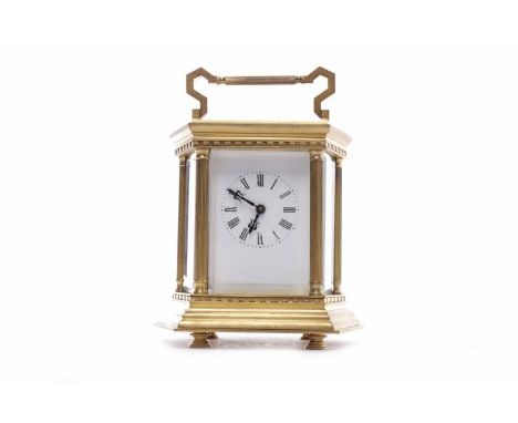 20TH CENTURY SEVEN GLASS BRASS CARRIAGE CLOCKwith Roman numeral enamel dial, platform escapement, movement signed 'Made in Fr