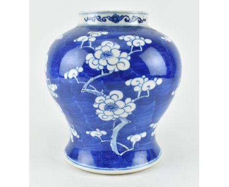 A Qing dynasty blue and white prunus ginger jar. Four character Kangxi Nian Zhi mark to base. Some restoration to rim. Measur