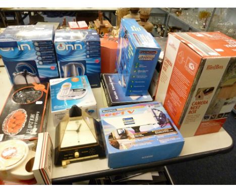 ELECTRIC HEDGE TRIMMER BOXED, THREE BOXED ELECTRIC KETTLES, A BOXED PRECISION CERAMIC SHAPER, BOXED PHONE AND A CAMERA NEST B