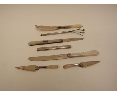 Mother of Pearl handled butter knife, penknife, book marks, pencil and twizzle stick (7) 