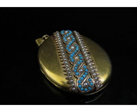 A Victorian turquoise and seed pearl set oval gold locket, monogrammed to verso, 4.5cm x 3.5cm, unmarked, 27.5g with sale rec