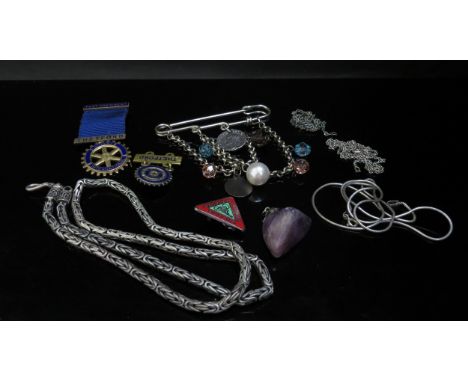 A bag of various bijouterie including silver Rotary medal 