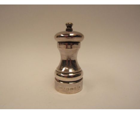 A Harrison Brothers &amp; Howson Ltd silver pepper grinder, London 2000, 10.5cm tall 